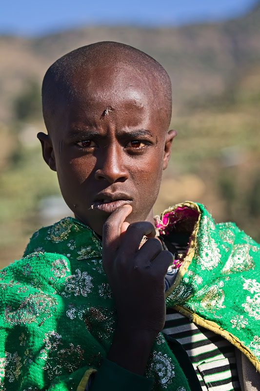 85   Young priest collection money along the road, for his living and study. Ethiopia 